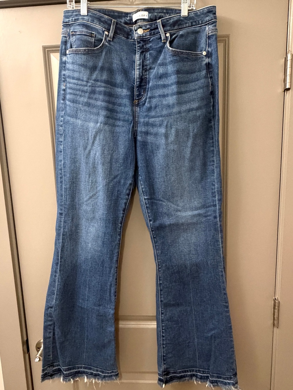 LOFT Curvy Slim Flare High Waisted Jeans with Raw Hem
